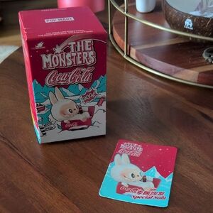 The Monsters Coca-Cola Labubu figurine. UNOPENED & AUTHENTIC - Special Sofa